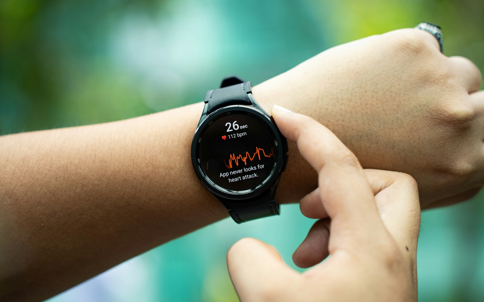 Close-up of a smartwatch on a wrist showing a health reading.